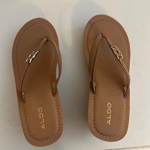 Also women’s sandals with wedge.  Size 8.5 in camel color